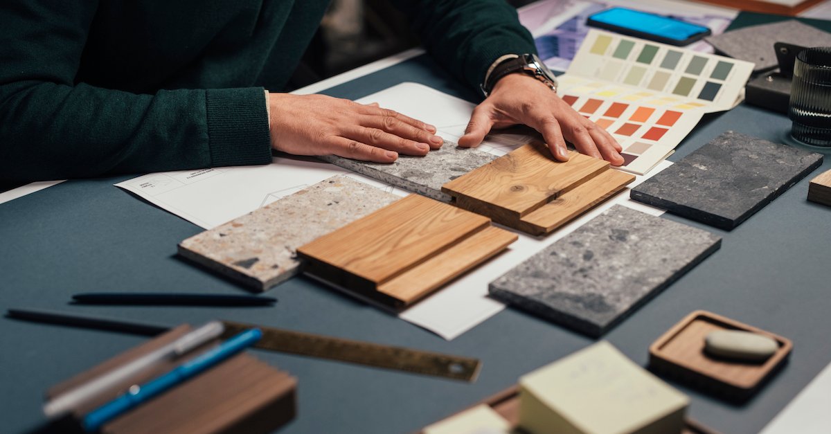Unrecognizable young designer working on his latest project - a close up
